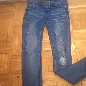 Dark wash, distressed jeans